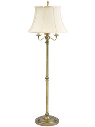 Newport Six-Way Floor Lamp in Antique Brass.